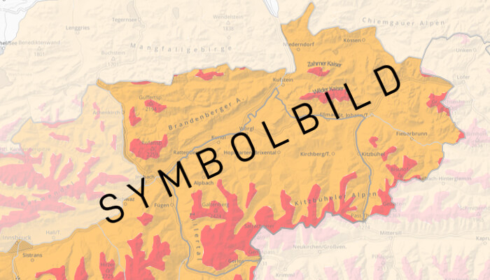 Symbolbild einer Karte von Österreich, die geografische Regionen in Orange und Rot darstellt.